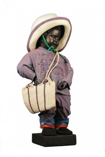Manneken-Pis in het kostuum van de Belgian Fair Trade Federation - Oxfam